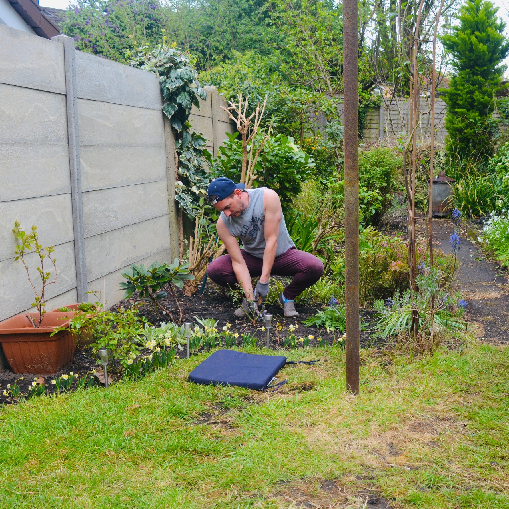 Peter Meager digging in the garden