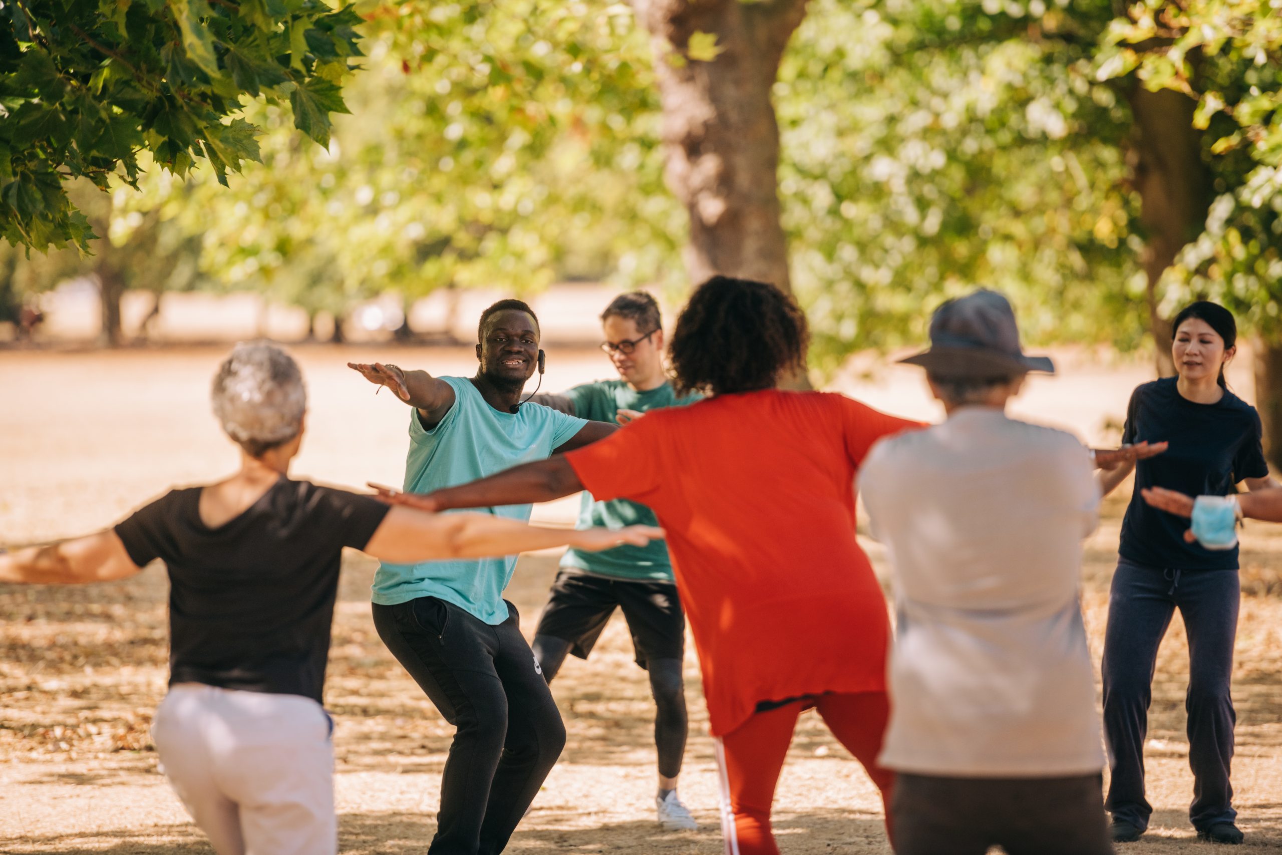 Image of participant dancing in the park. Credit Royal Greenwich Park