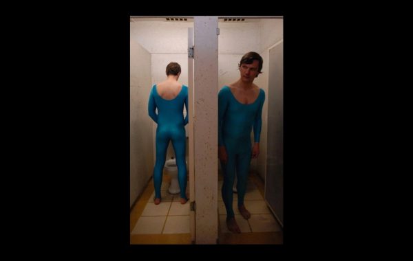 30 years in pictures: New Art Club and Jonathan Burrows. Two artists from New Art Club are in blue lycra unitards in the toilets at the Borough Hall.